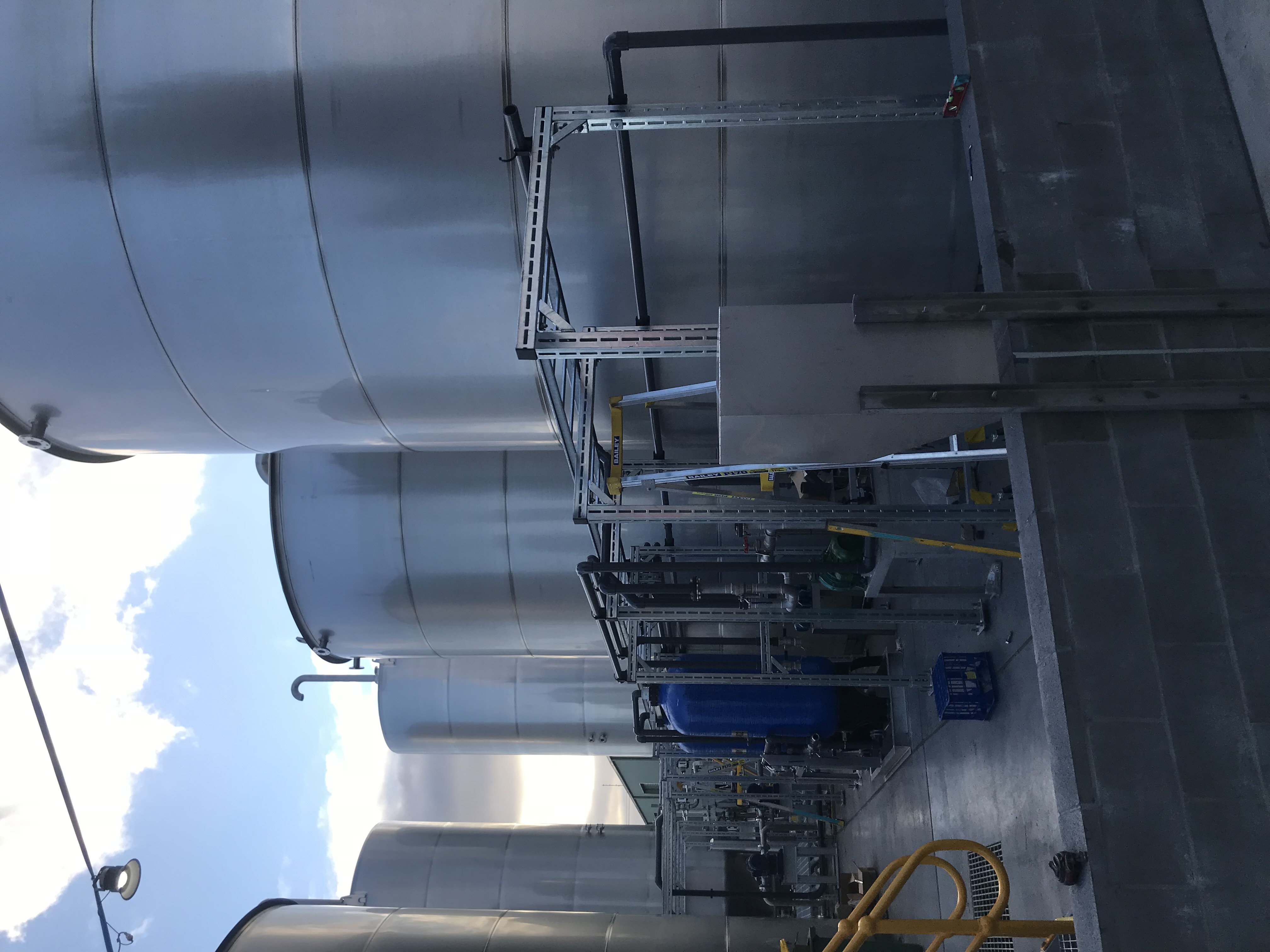 JJ Richards oily water separation plant — process piping and water tank