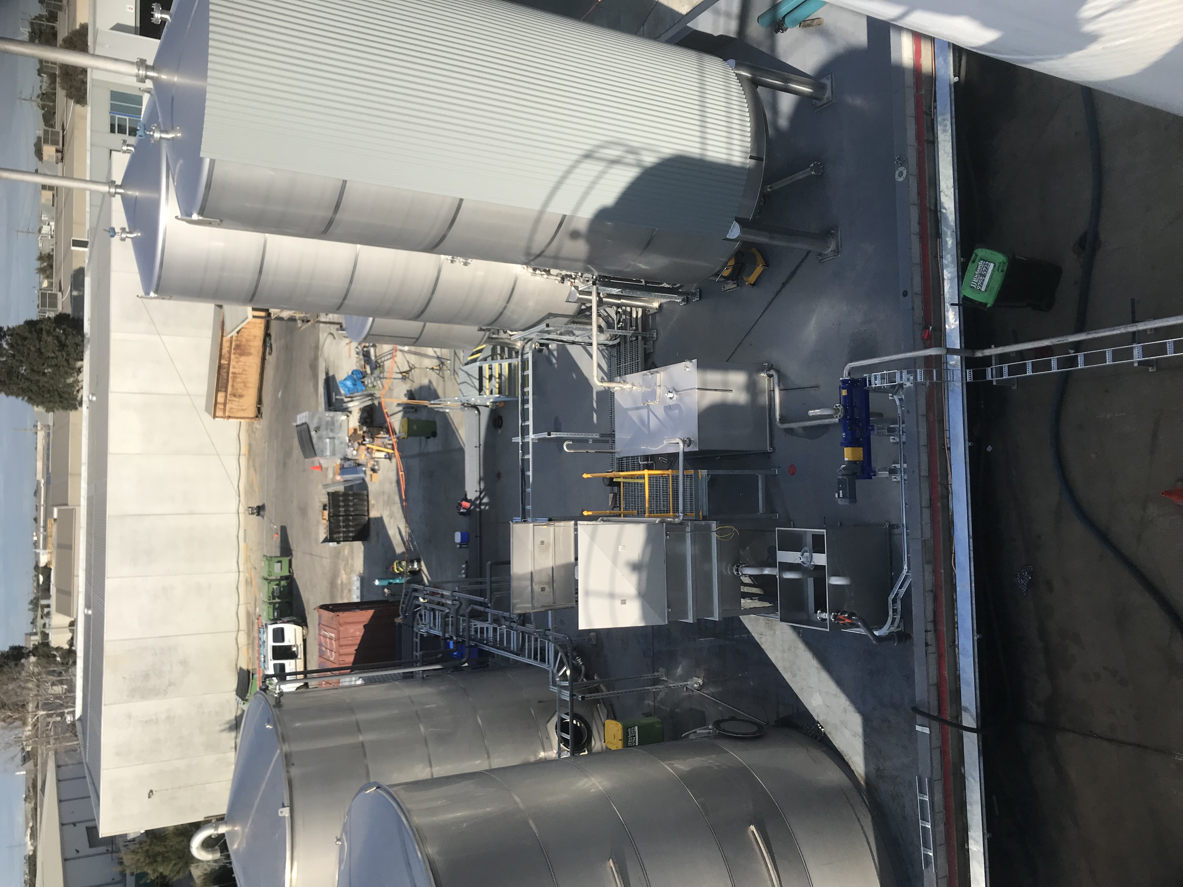 JJ Richards oily water separation plant — tank installation with crane